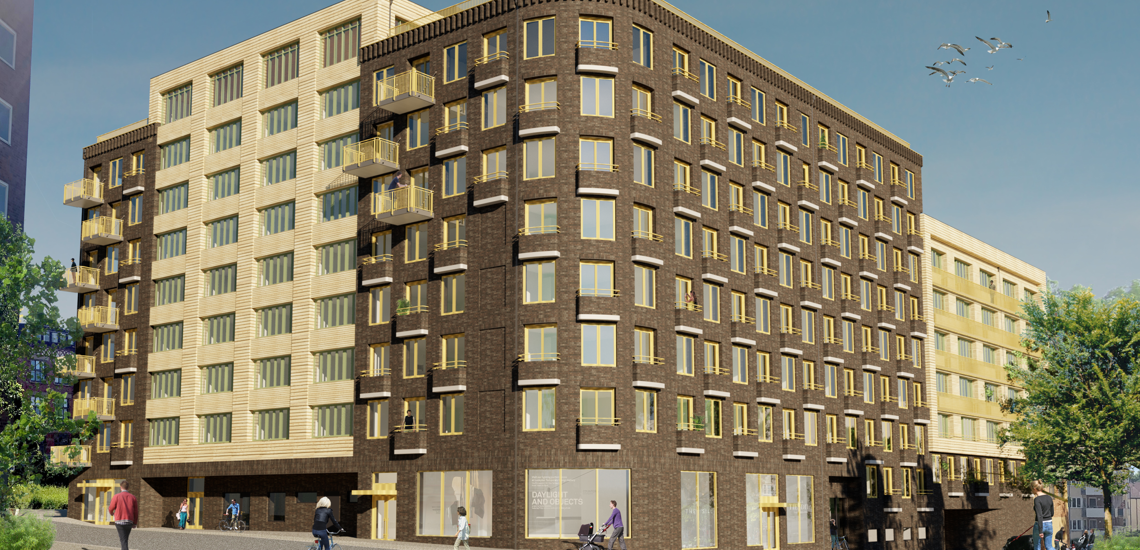 Mörkt sjuvåningshus med rundade fasad och affärslokaler i markplan.